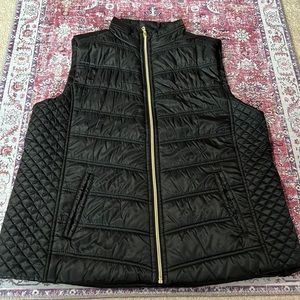 Black puffer vest with gold tone zipper size large